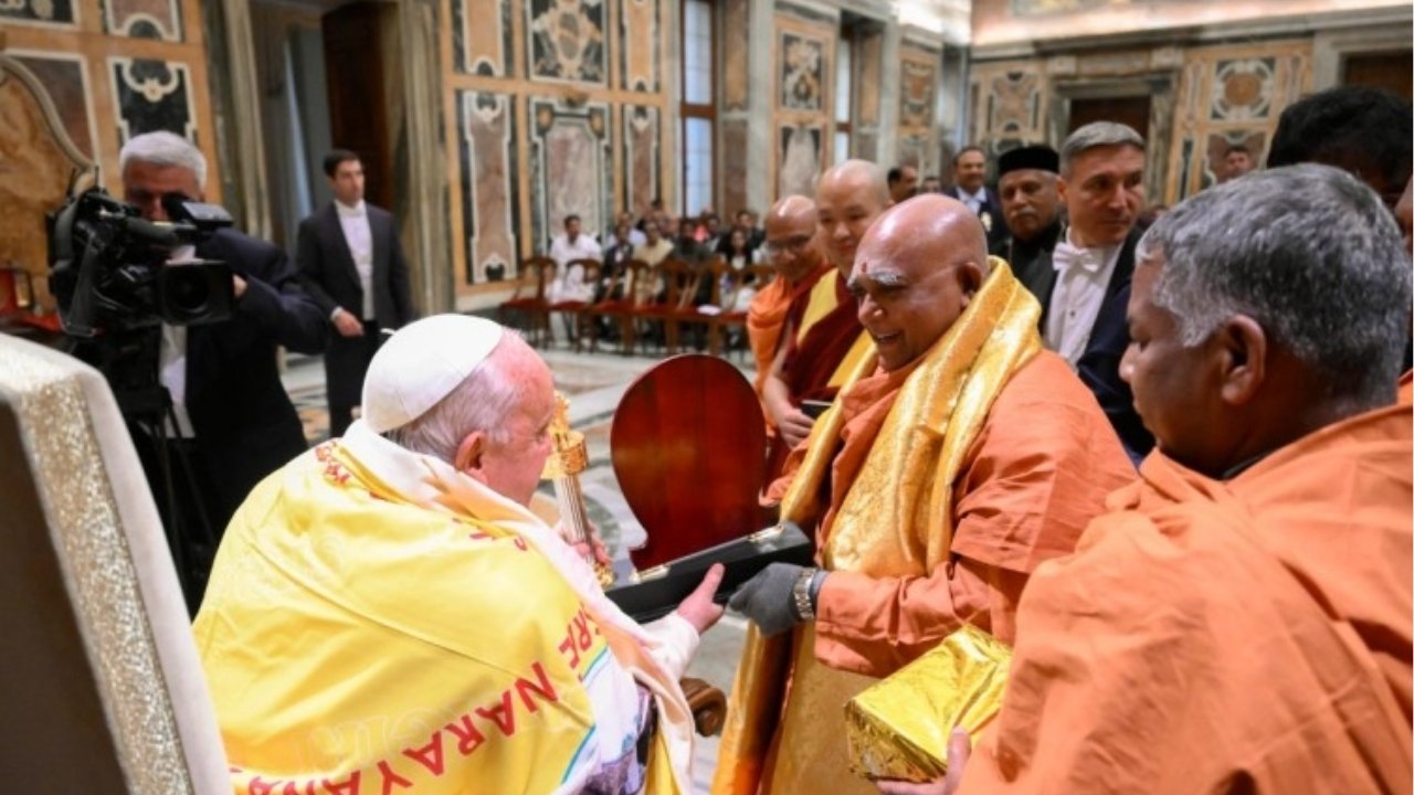 Pope Francis greets participants in the All Religions' Conference